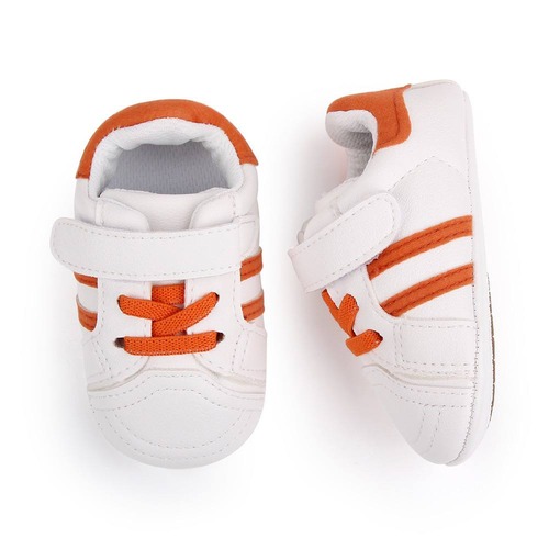 Orange laced sneakers